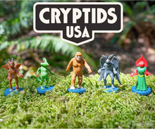 Load image into Gallery viewer, Cryptids USA Toy Figures set Monopoly Archie McPhee Corral of Cryptids Gag Gift – USA Monster Set w/Bigfoot, Mothman &amp; More – Funny Stocking Stuffer for Cryptid Lovers &amp; Fans of American Folklore Chupacabra